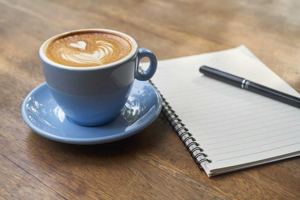 Finished latte with smooth microfoam and a simple heart pattern on top